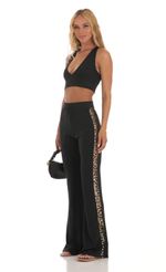 Picture Sequin Two Piece Set in Black. Source: https://media-img.lucyinthesky.com/data/Jul23/150xAUTO/96643523-f83e-4c04-a399-7306e6658c30.jpg