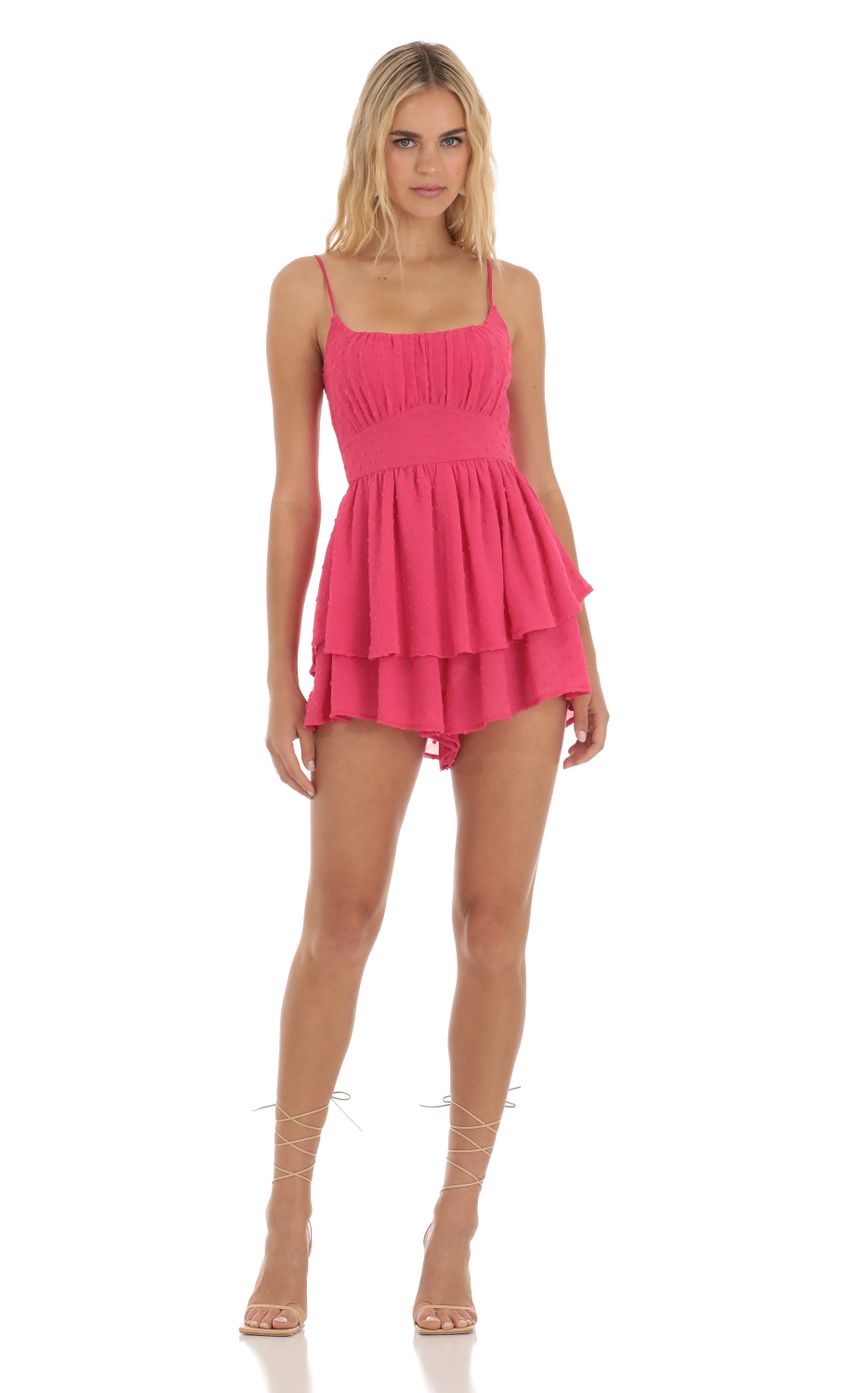 Picture Dotted Ruffle Romper in Pink. Source: https://media-img.lucyinthesky.com/data/Jul23/850xAUTO/0fd556ef-ff81-43b9-ab5d-d1ba95e2b828.jpg
