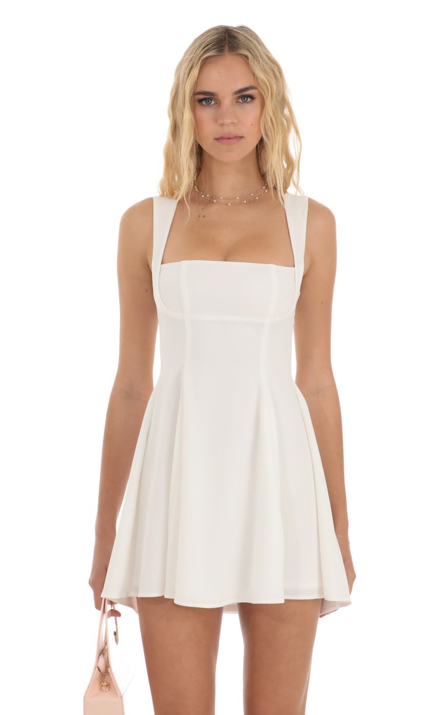 Picture Fit and Flare Dress in White. Source: https://media-img.lucyinthesky.com/data/Jul23/850xAUTO/2484a351-2800-422f-9309-254fa7779f72.jpg