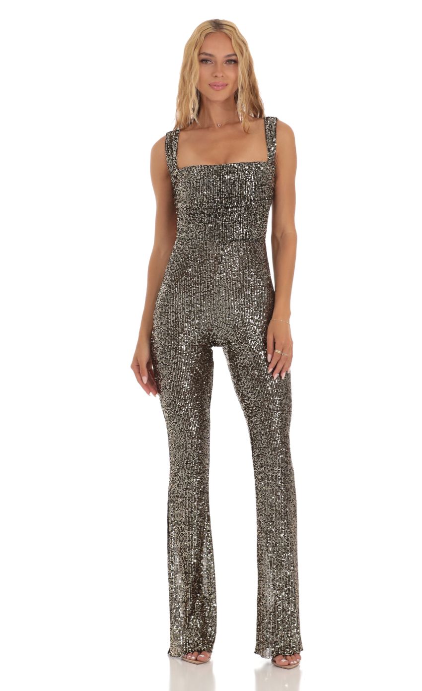 Picture Gold Sequin Back Bow Tie Jumpsuit in Black. Source: https://media-img.lucyinthesky.com/data/Jul23/850xAUTO/5526b216-672e-4c75-9a68-95f5d84a0964.jpg