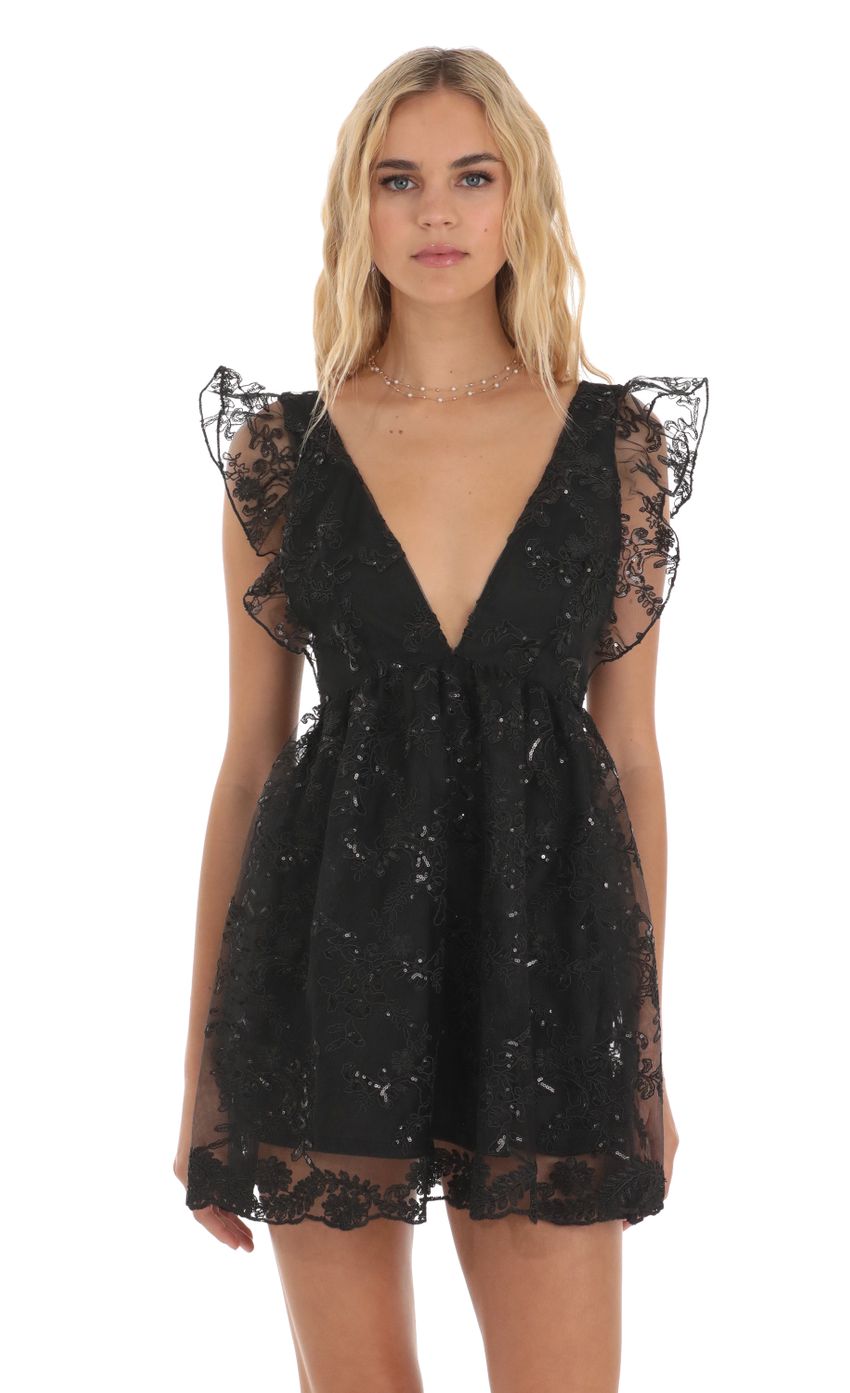 Picture Flor Sequin Baby Doll Dress in Black. Source: https://media-img.lucyinthesky.com/data/Jul23/850xAUTO/6b60cb10-1413-4c8c-a758-8dbb22625bec.jpg