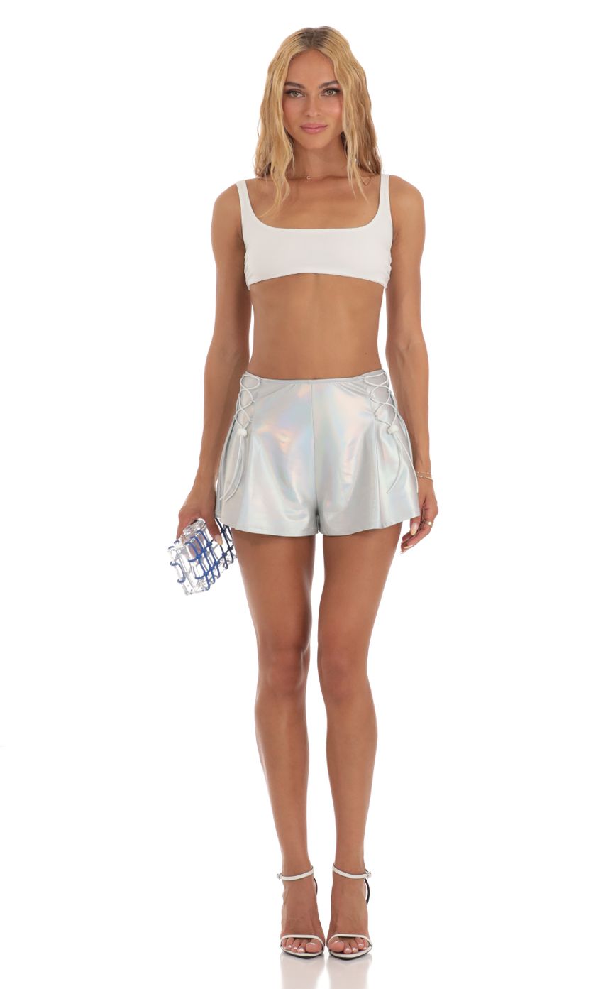 Picture Iridescent Shorts in Silver. Source: https://media-img.lucyinthesky.com/data/Jul23/850xAUTO/862c9d17-f003-4b46-a425-9114c77d388b.jpg