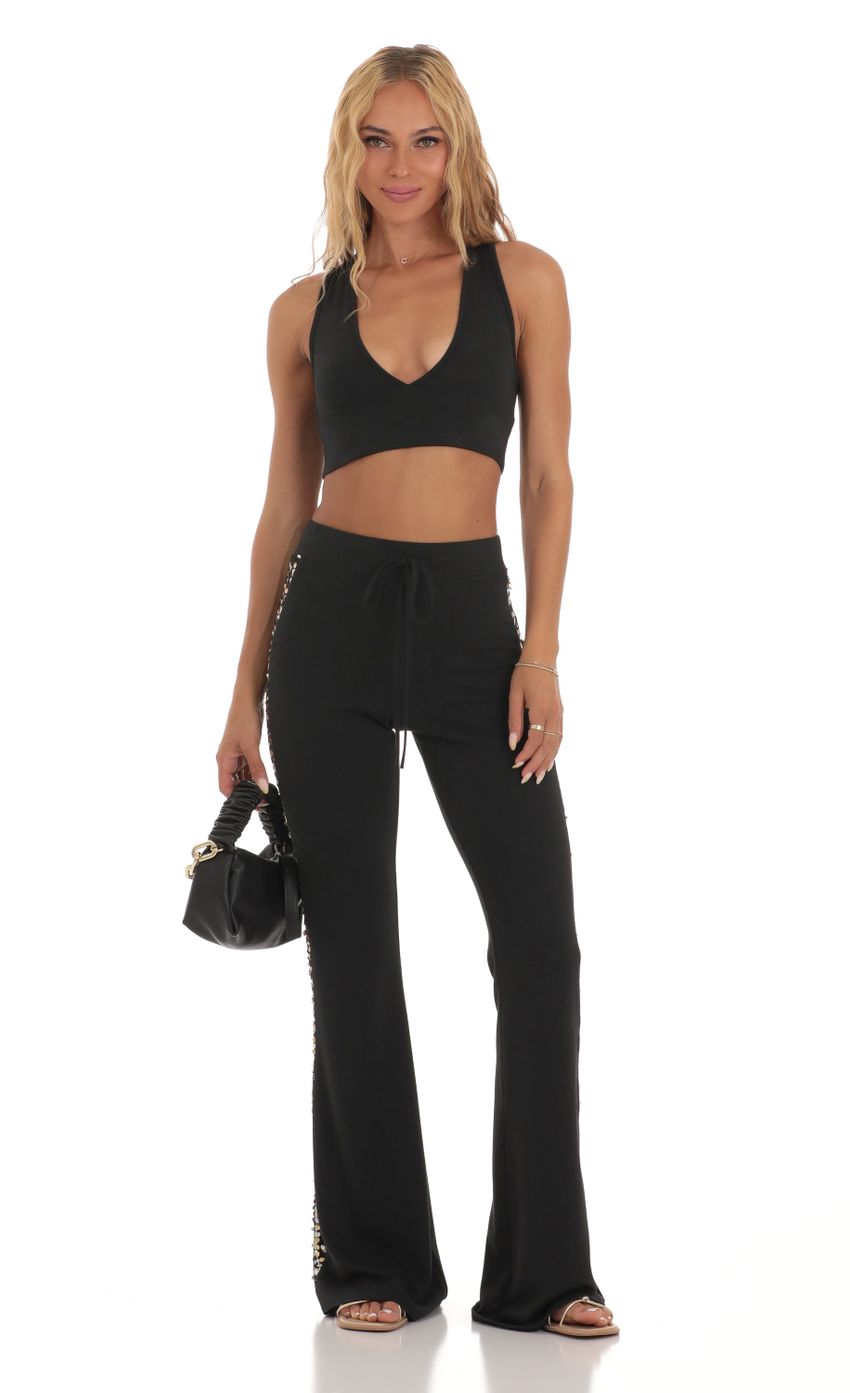 Picture Sequin Two Piece Set in Black. Source: https://media-img.lucyinthesky.com/data/Jul23/850xAUTO/914e4f06-8b5d-4cac-a189-ff85649398a3.jpg