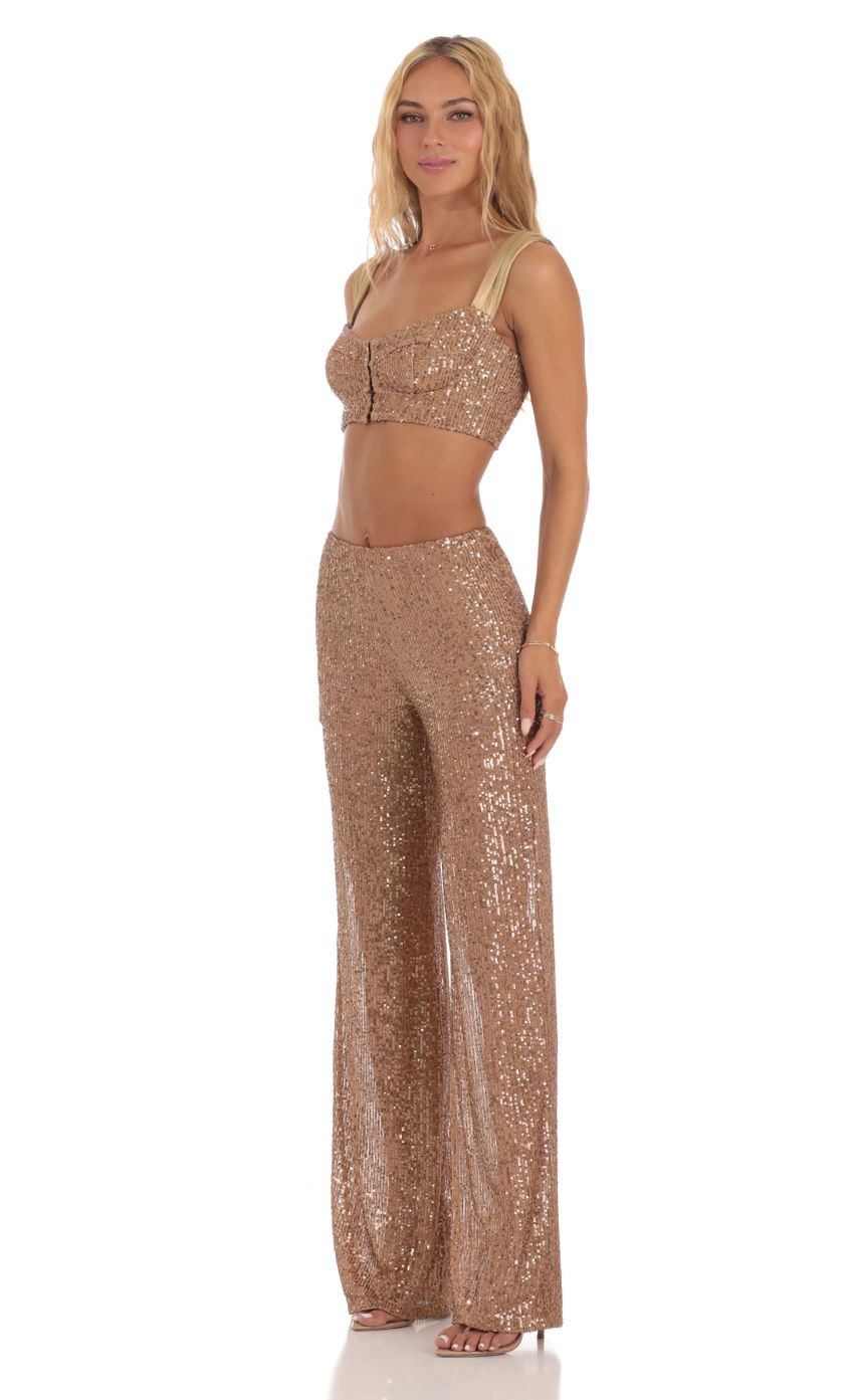 Picture Sequin Two Piece Set in Gold. Source: https://media-img.lucyinthesky.com/data/Jul23/850xAUTO/bbff8da6-add2-40b2-9546-e646a25cf170.jpg
