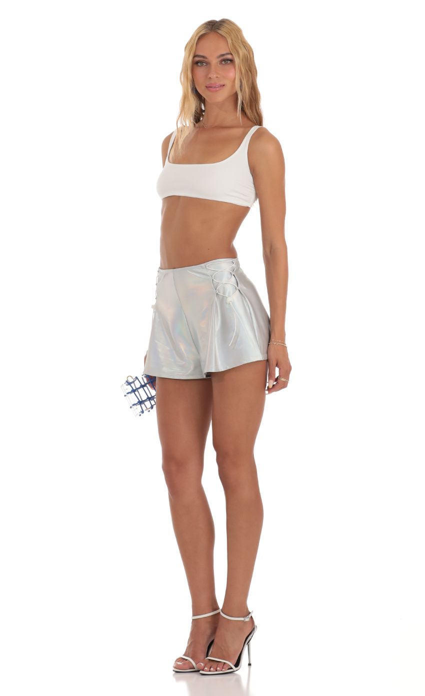 Picture Iridescent Shorts in Silver. Source: https://media-img.lucyinthesky.com/data/Jul23/850xAUTO/c8ed527f-be63-459e-8223-7eb8f0cc1837.jpg