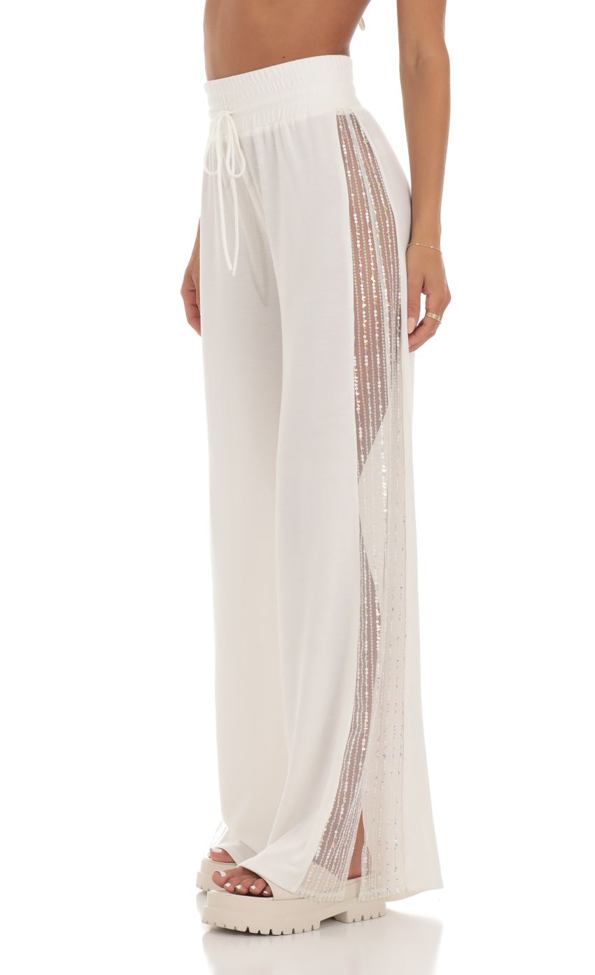 Picture Sequin One Shoulder Two Piece Set in White. Source: https://media-img.lucyinthesky.com/data/Jul23/850xAUTO/f811c7c8-ec7d-4043-bb6e-46aea9914245.jpg