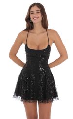 Picture Sequin Beaded Mini Dress in Black. Source: https://media-img.lucyinthesky.com/data/Jul24/150xAUTO/0ad002fd-85a3-49b7-95eb-b58379de3084.jpg