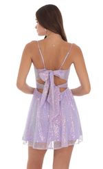 Picture Sequin Twist A-line Dress in Lavender. Source: https://media-img.lucyinthesky.com/data/Jul24/150xAUTO/6b3cf611-dfb0-4a02-82c1-f04c7d1ef52a.jpg