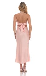 Picture Satin Twist Cutout Midi Dress in Pink. Source: https://media-img.lucyinthesky.com/data/Jul24/150xAUTO/70aca99b-cc0f-41e3-9a01-7dbdb539ff1c.jpg