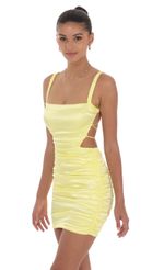 Picture Satin Cutout Bodycon Dress in Yellow. Source: https://media-img.lucyinthesky.com/data/Jul24/150xAUTO/73e4a8a0-8a53-4b0a-a619-f40bf52b9856.jpg