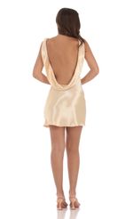 Picture Satin Open Back Dress in Champagne. Source: https://media-img.lucyinthesky.com/data/Jul24/150xAUTO/a7d51f4c-c26f-4686-b3f7-5c083cc37998.jpg