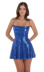 Picture Sequin Cowl Neck Dress in Blue. Source: https://media-img.lucyinthesky.com/data/Jul24/150xAUTO/b7cb4da9-436e-49c4-b374-74d48eb84544.jpg