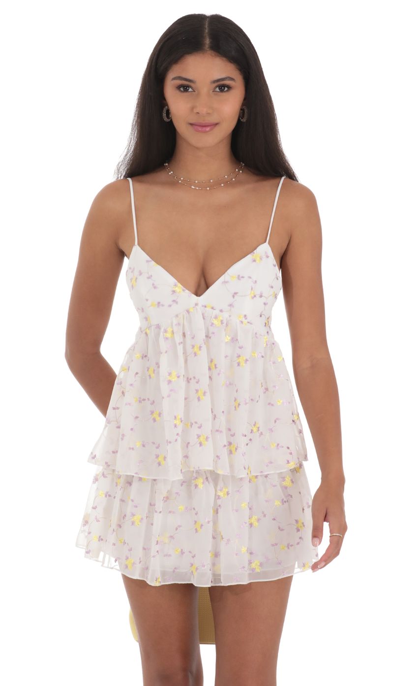 Picture Floral Ruffle Tiered Dress in White. Source: https://media-img.lucyinthesky.com/data/Jul24/850xAUTO/04e028a9-5043-4ce9-87a0-6c050e886f44.jpg