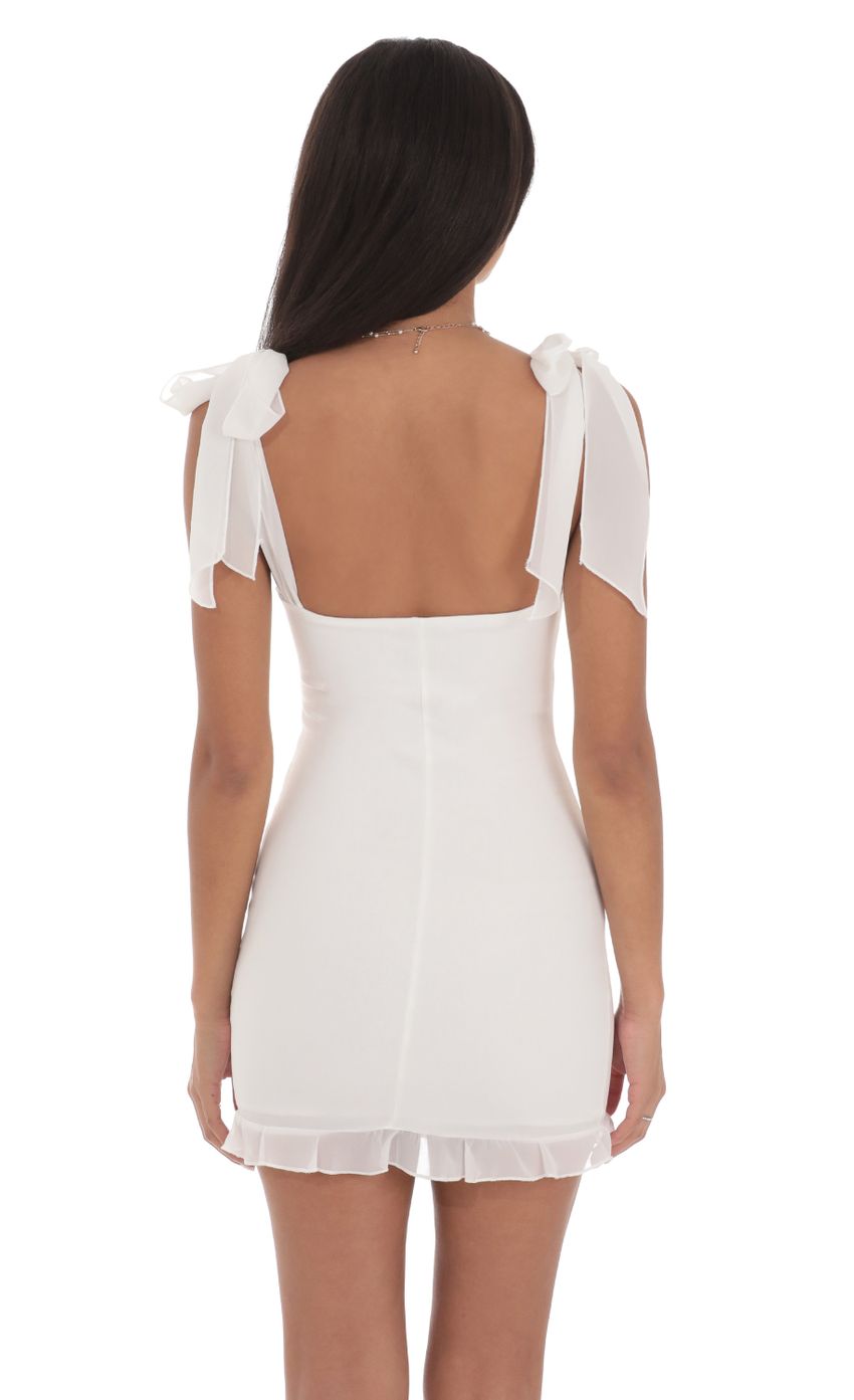 Picture Shoulder Ties Ruffle Dress in White. Source: https://media-img.lucyinthesky.com/data/Jul24/850xAUTO/12570a73-4ac1-40b5-866b-219e53003a96.jpg