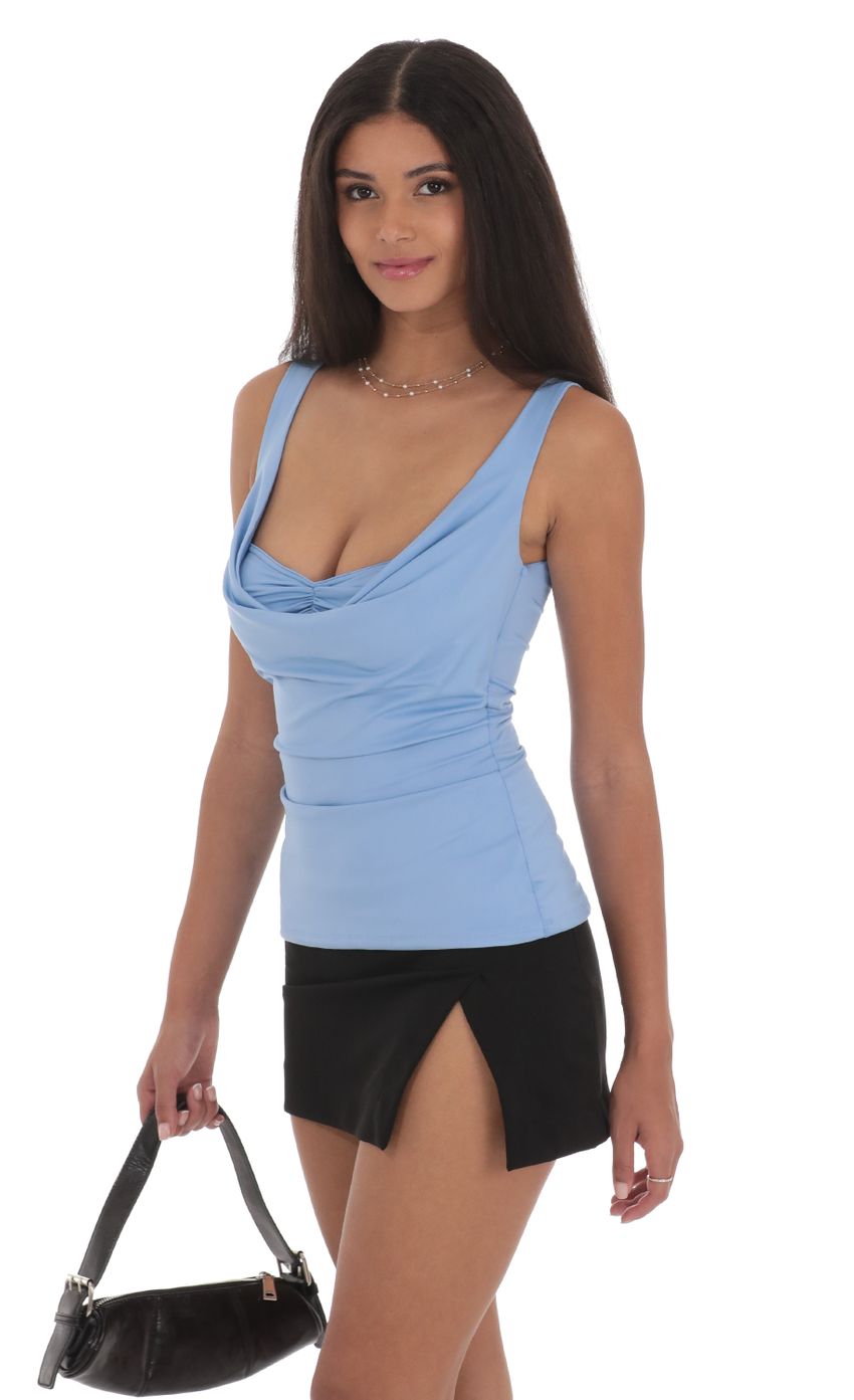 Picture Plunge Cutout Top in Blue. Source: https://media-img.lucyinthesky.com/data/Jul24/850xAUTO/2753e062-9864-485d-af3d-262dd4077d52.jpg