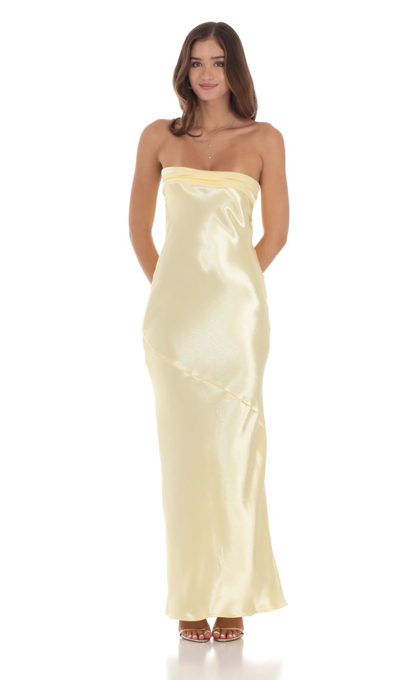 Picture Strapless Satin Open Back Maxi Dress in Yellow. Source: https://media-img.lucyinthesky.com/data/Jul24/850xAUTO/35d0e167-e566-4128-b8fb-1a5385f0b08f.jpg