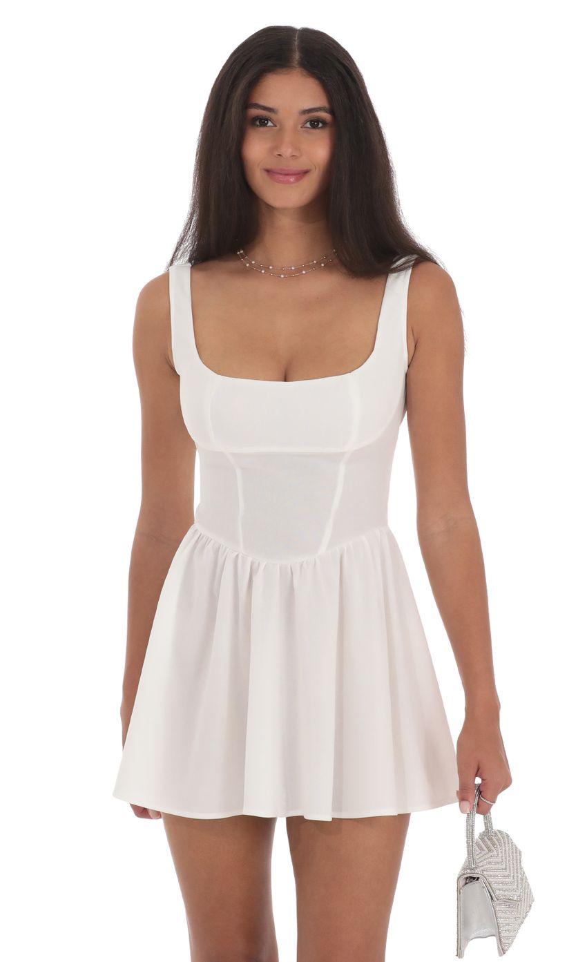 Picture Open Back Bow Dress in White. Source: https://media-img.lucyinthesky.com/data/Jul24/850xAUTO/439247fc-93e1-4eb1-8907-207eee559c29.jpg