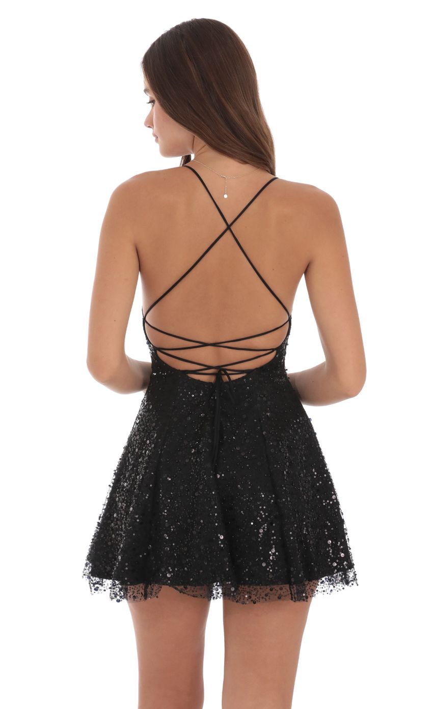 Picture Sequin Beaded Mini Dress in Black. Source: https://media-img.lucyinthesky.com/data/Jul24/850xAUTO/52be58c4-f3de-4b87-8d39-b49bc741e477.jpg