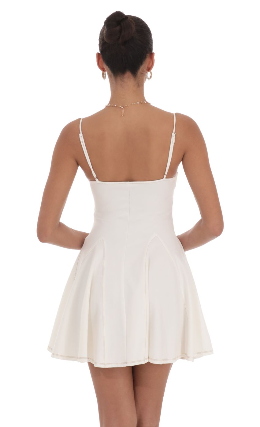 Picture Brown Stitch Fit and Flare Dress in Off White. Source: https://media-img.lucyinthesky.com/data/Jul24/850xAUTO/5352ac5b-d8a3-4b13-992c-2b0f8907f420.jpg