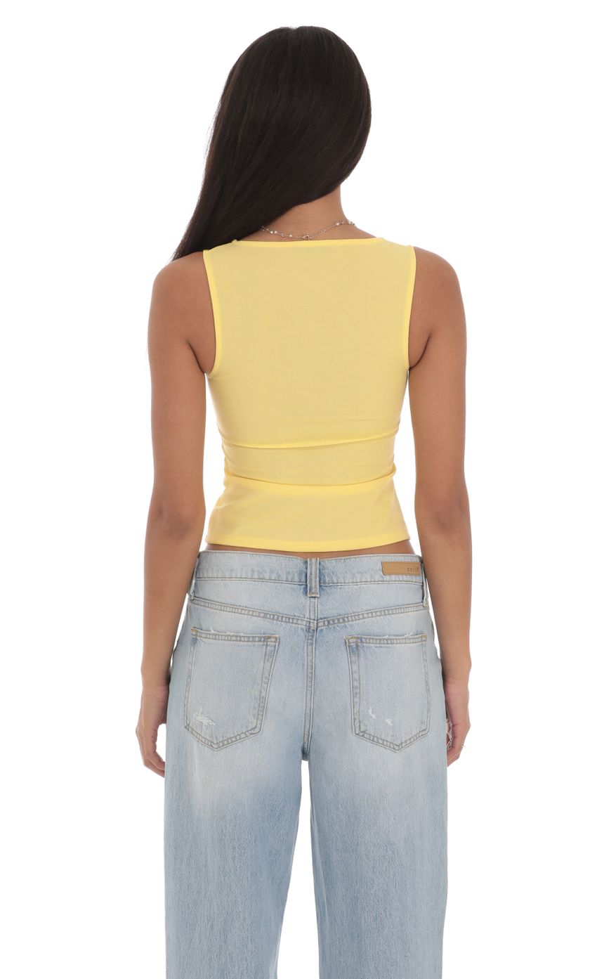 Picture Double Bow Top in Yellow. Source: https://media-img.lucyinthesky.com/data/Jul24/850xAUTO/611efa19-65d9-46d2-a82e-5bcb4b54b888.jpg