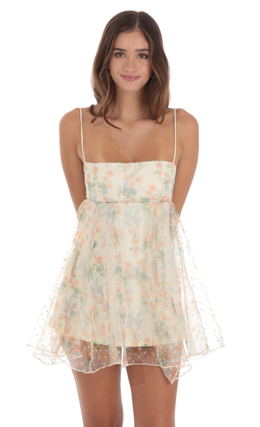 Picture Dotted Floral Babydoll Dress in Creamy Yellow. Source: https://media-img.lucyinthesky.com/data/Jul24/850xAUTO/6e4ef8c8-b072-4726-b298-071b9316abe4.jpg