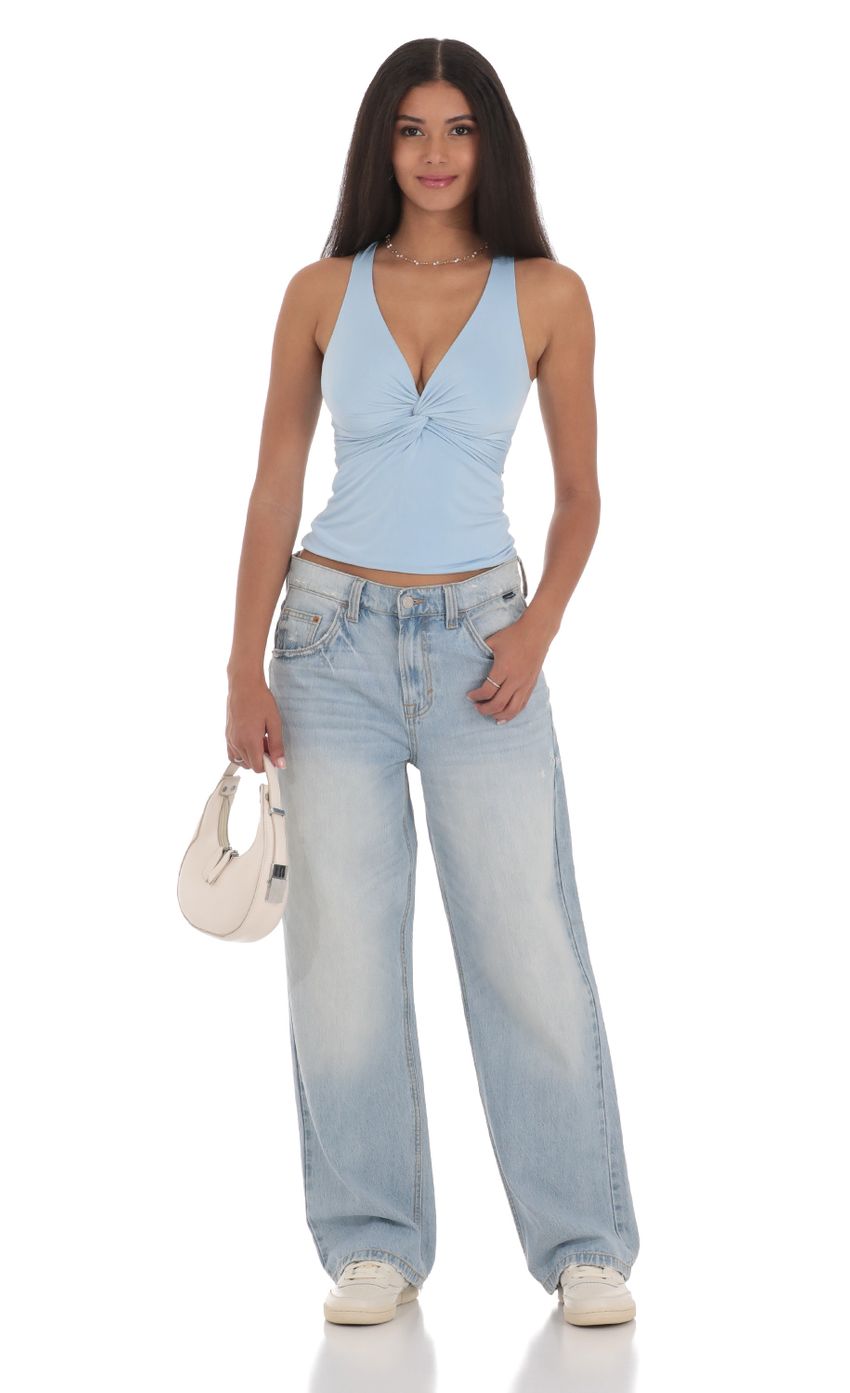 Picture Twist Cross Back Top in Blue. Source: https://media-img.lucyinthesky.com/data/Jul24/850xAUTO/7ce31dd0-7e9d-4fea-9f99-c96e00326e45.jpg