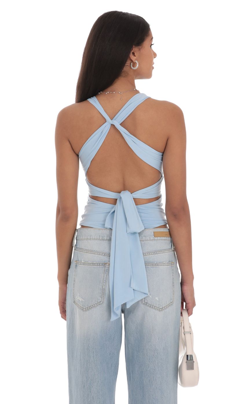 Picture Twist Cross Back Top in Blue. Source: https://media-img.lucyinthesky.com/data/Jul24/850xAUTO/81e557a9-abaa-4de0-981b-10233dd648e3.jpg