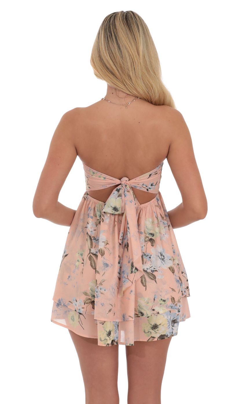 Picture Floral Shimmer Cutout Babydoll Dress in Pink. Source: https://media-img.lucyinthesky.com/data/Jul24/850xAUTO/83b27993-f2c0-4fc7-83ea-c02fcfa2947e.jpg