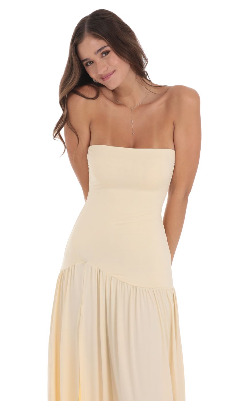 Picture Strapless Drop Waist Maxi Dress in Cream. Source: https://media-img.lucyinthesky.com/data/Jul24/850xAUTO/85bc5690-8dc7-4ff9-8ee4-bf758b954a2d.jpg