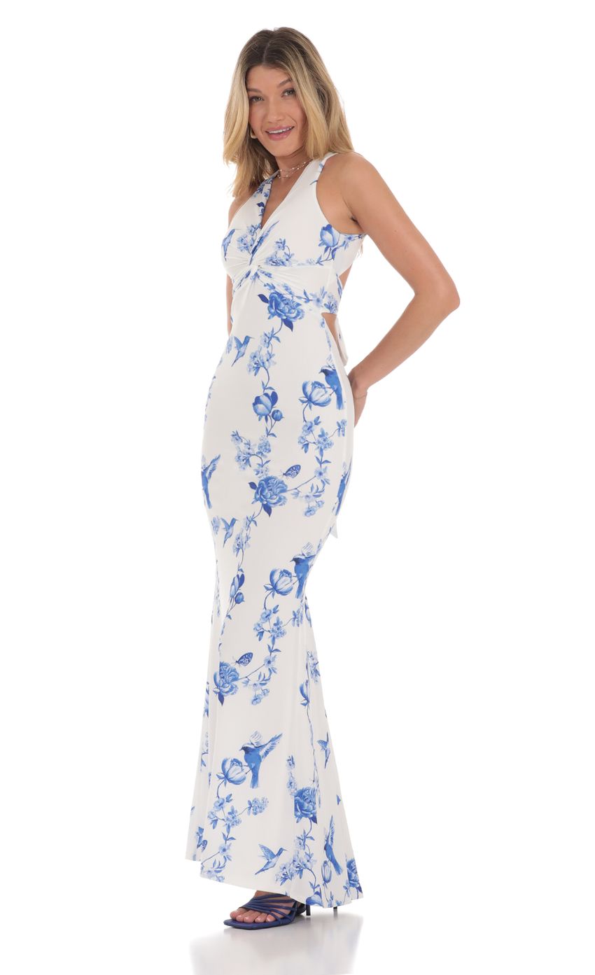 Picture Floral Front Twist Maxi Dress in White. Source: https://media-img.lucyinthesky.com/data/Jul24/850xAUTO/9417dd7b-380a-44a5-80e1-4d878f15efb4.jpg