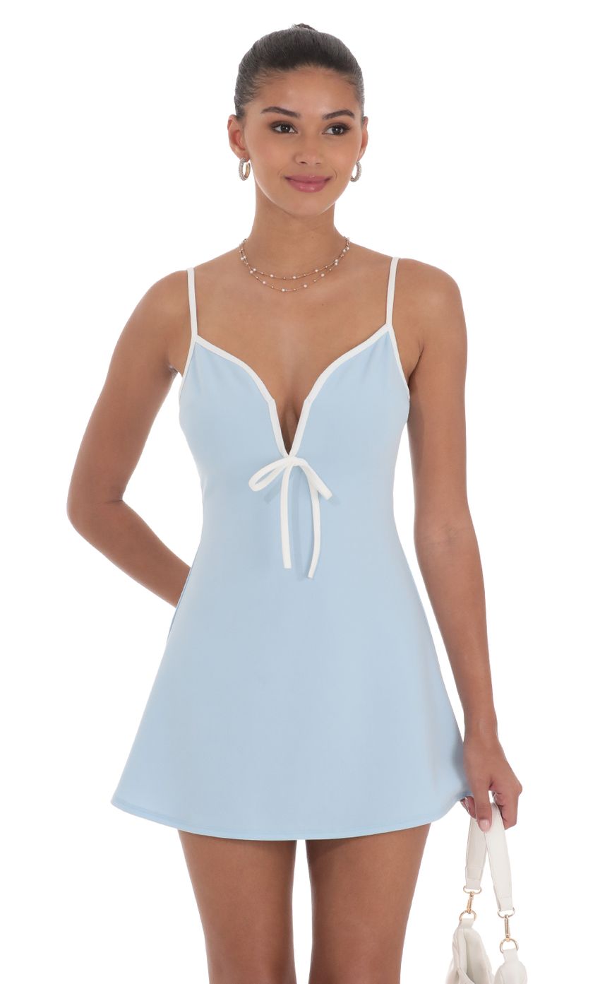 Picture Outline Front Tie Dress in Blue. Source: https://media-img.lucyinthesky.com/data/Jul24/850xAUTO/98a002ac-77d7-48bf-8482-a3ef13e4fe80.jpg