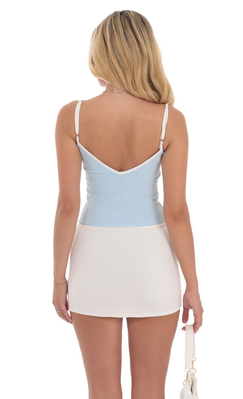 Picture Outline Front Tie Top in Baby Blue. Source: https://media-img.lucyinthesky.com/data/Jul24/850xAUTO/b3cf72da-f73a-4ca6-9e81-a284209897bf.jpg