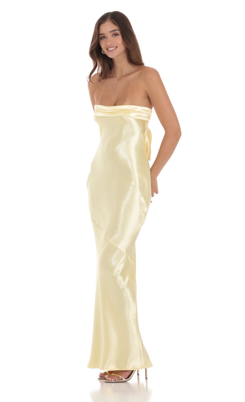 Picture Strapless Satin Open Back Maxi Dress in Yellow. Source: https://media-img.lucyinthesky.com/data/Jul24/850xAUTO/ce4db669-619c-461f-b3cd-b39715ea54c0.jpg