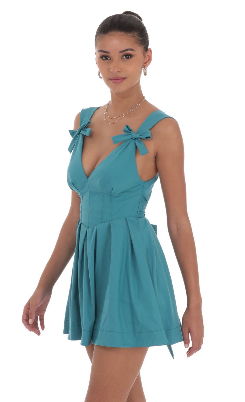 Picture Double Bow A-Line Dress in Turquoise Blue. Source: https://media-img.lucyinthesky.com/data/Jul24/850xAUTO/dfc58f16-b703-45c0-9e2c-2c897ef845e5.jpg