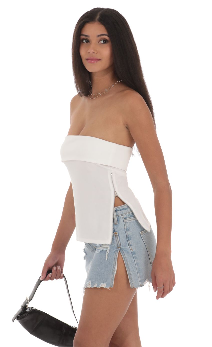 Picture Zipper Slit Top in White. Source: https://media-img.lucyinthesky.com/data/Jul24/850xAUTO/e321f4e0-0d1f-4af2-9ed8-7f5c717d32f7.jpg