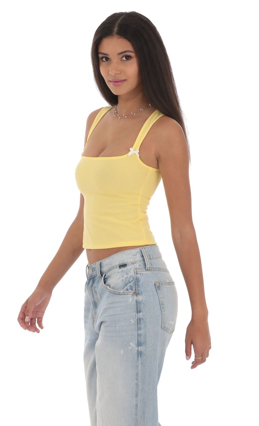 Picture Double Bow Top in Yellow. Source: https://media-img.lucyinthesky.com/data/Jul24/850xAUTO/e3bcd224-492b-4d86-95aa-9edabf02dcfb.jpg