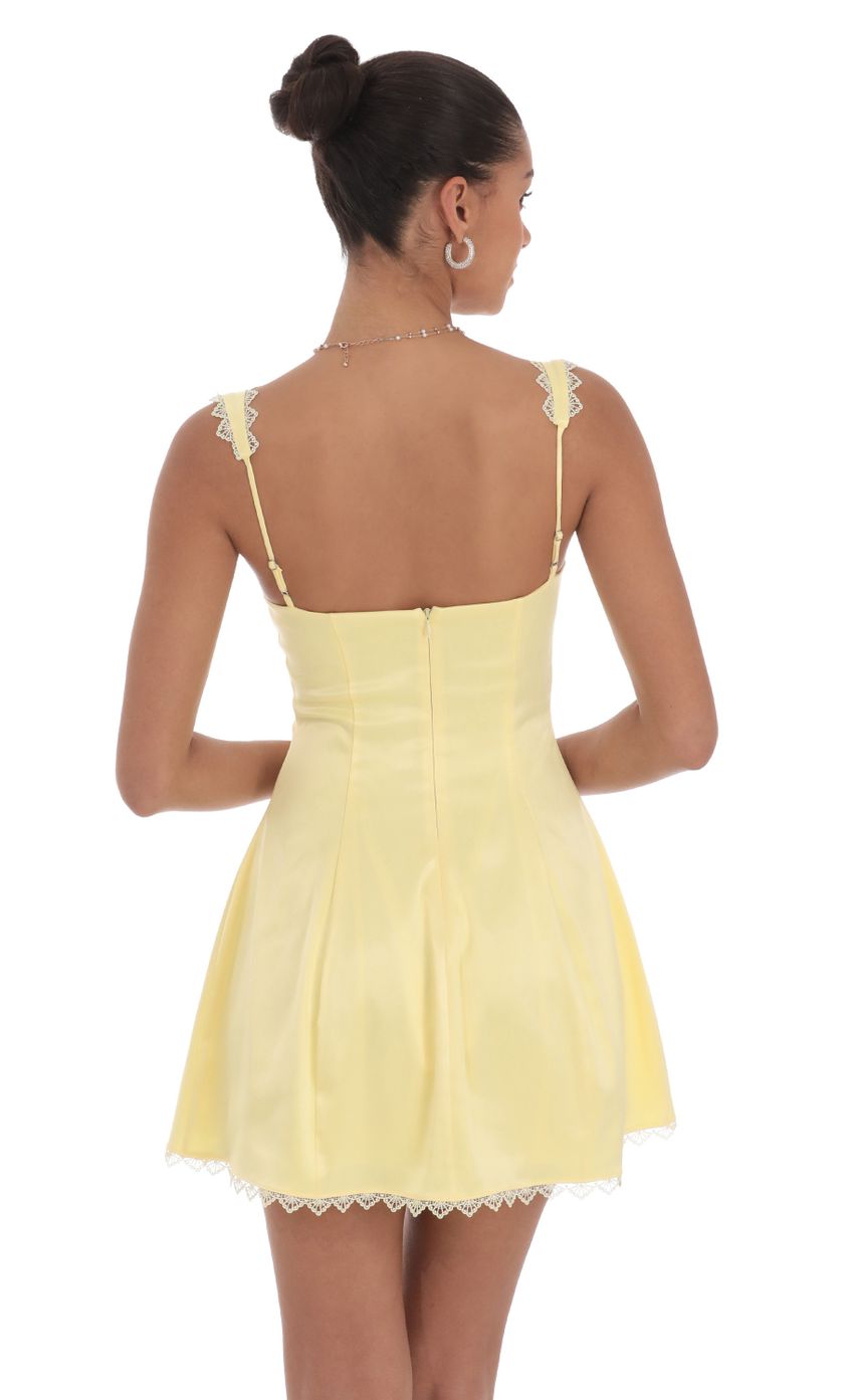 Picture Satin Embroidered Fit and Flare Dress in Yellow. Source: https://media-img.lucyinthesky.com/data/Jul24/850xAUTO/e6850c4d-ff12-4ebd-9b44-8b4c2028c985.jpg