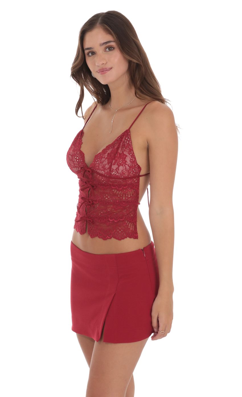 Picture Lace Top in Cream and Red. Source: https://media-img.lucyinthesky.com/data/Jul24/850xAUTO/e7e82217-2ee8-4138-87f4-9e0271df7cfa.jpg