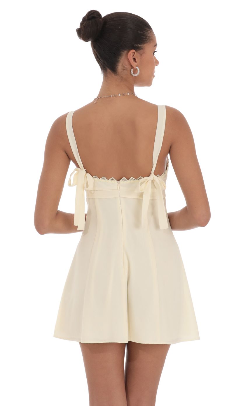 Picture Ribbon Embroidered Trim Dress in Cream. Source: https://media-img.lucyinthesky.com/data/Jul24/850xAUTO/f35317ba-7bae-40e0-95f8-3e5fb8762172.jpg