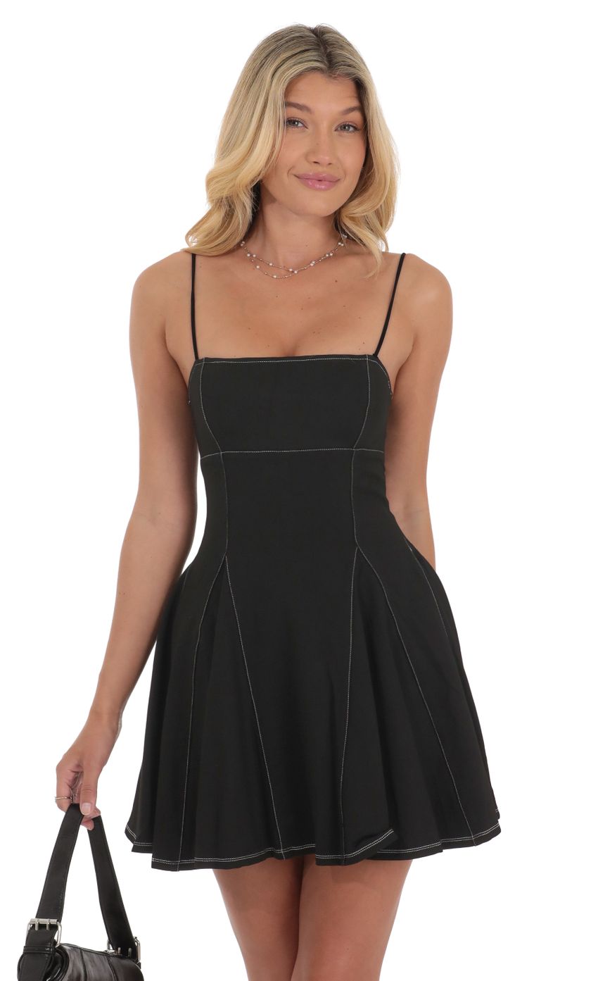 Picture White Stitch Fit and Flare Dress in Black. Source: https://media-img.lucyinthesky.com/data/Jul24/850xAUTO/f9284b7b-20d0-4328-8816-3c6d19a0fad4.jpg