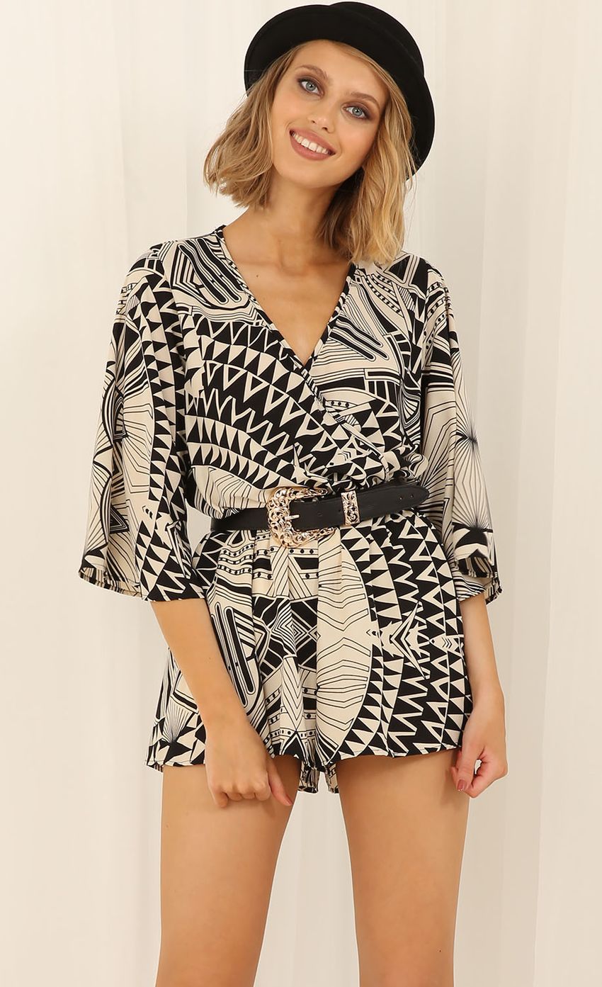 Picture Geometrical V-Neck Playsuit In Monochrome. Source: https://media-img.lucyinthesky.com/data/Jun15_1/850xAUTO/0Y5A7640.JPG