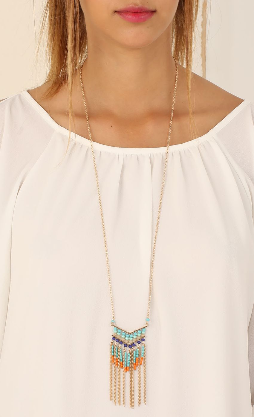 Picture Long Fringed Bead Necklace. Source: https://media-img.lucyinthesky.com/data/Jun15_2/850xAUTO/0Y5A1800.JPG