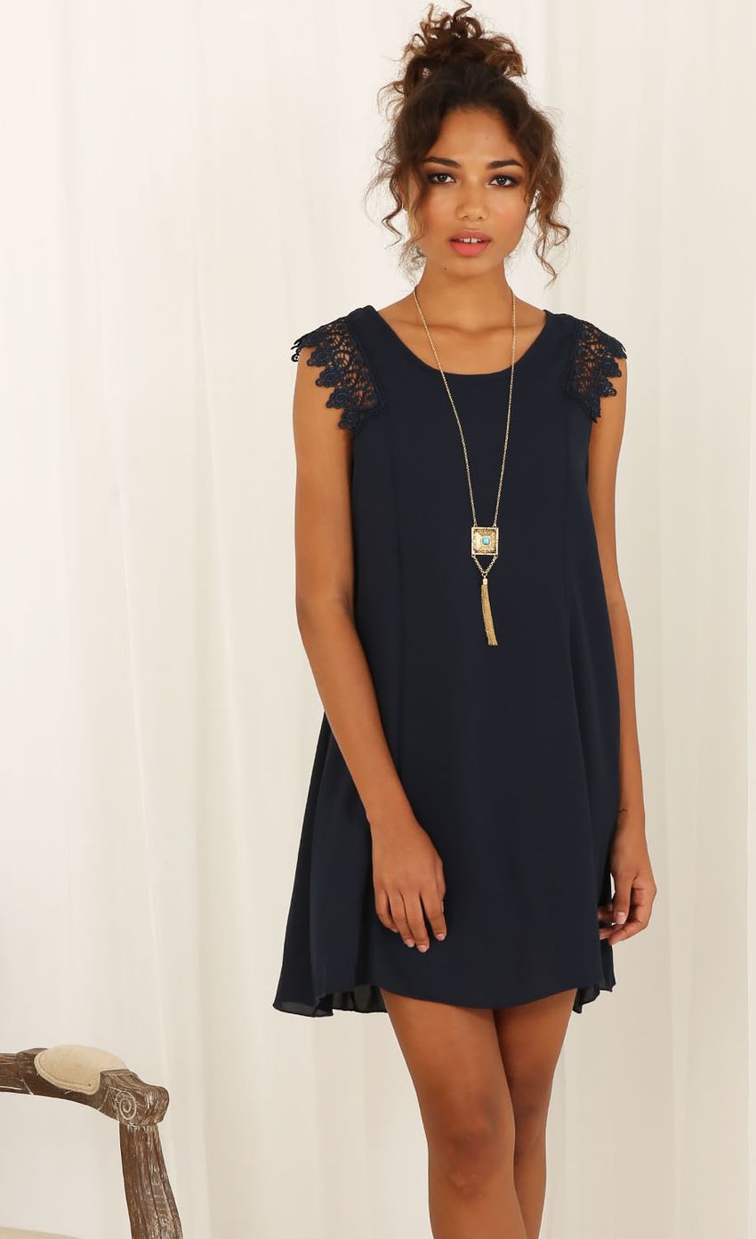 Picture Lace Sleeved Shift Dress In Navy. Source: https://media-img.lucyinthesky.com/data/Jun15_2/850xAUTO/0Y5A5773.JPG