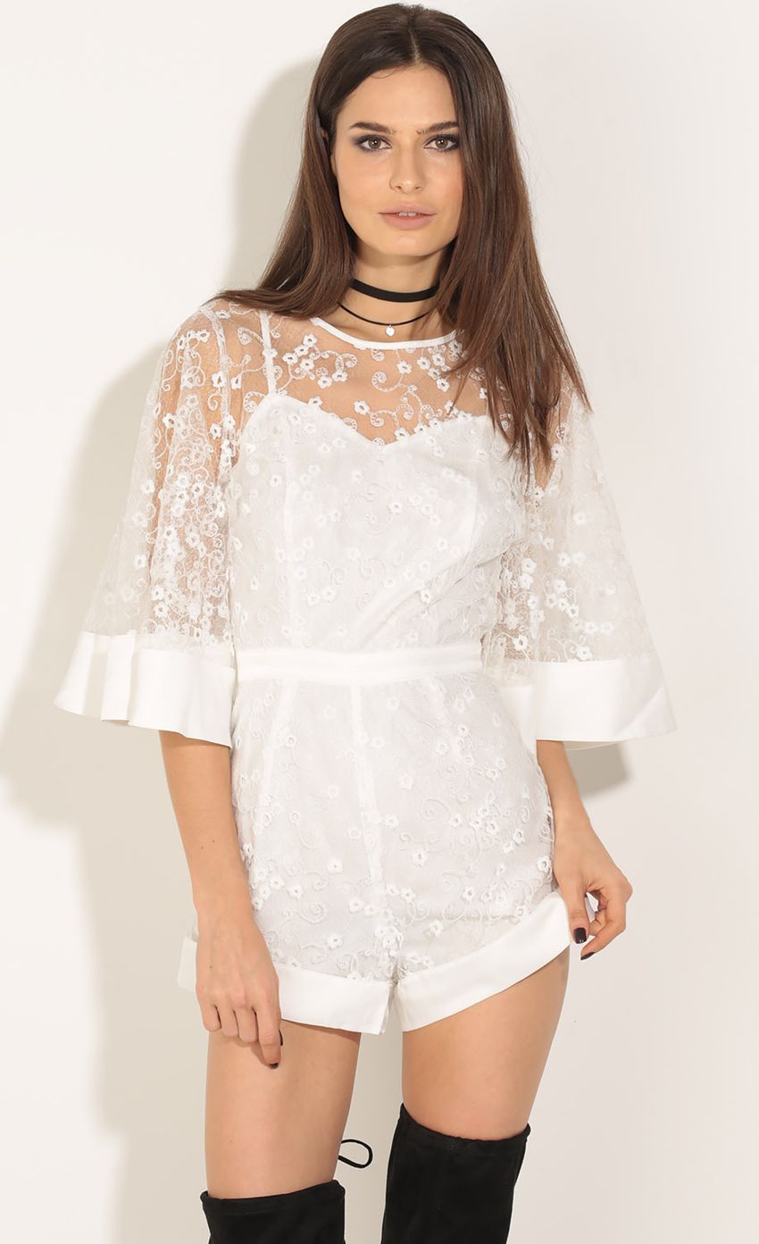 Picture Sheer Lace Floral Romper In White. Source: https://media-img.lucyinthesky.com/data/Jun16_1/850xAUTO/0Y5A6192.JPG