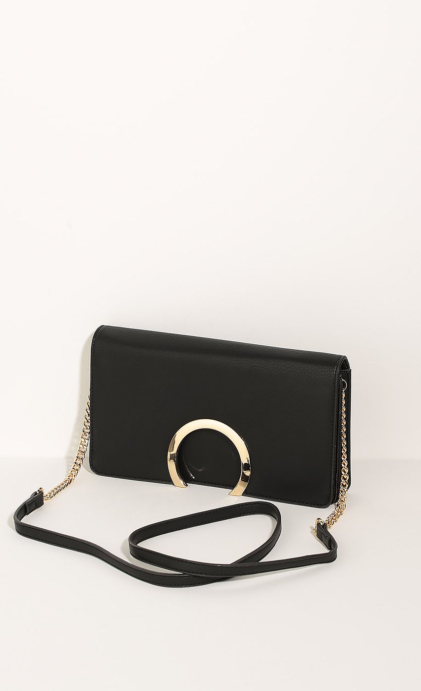 Picture Leather Circle Clutch In Black. Source: https://media-img.lucyinthesky.com/data/Jun16_1/850xAUTO/0Y5A8472B.JPG
