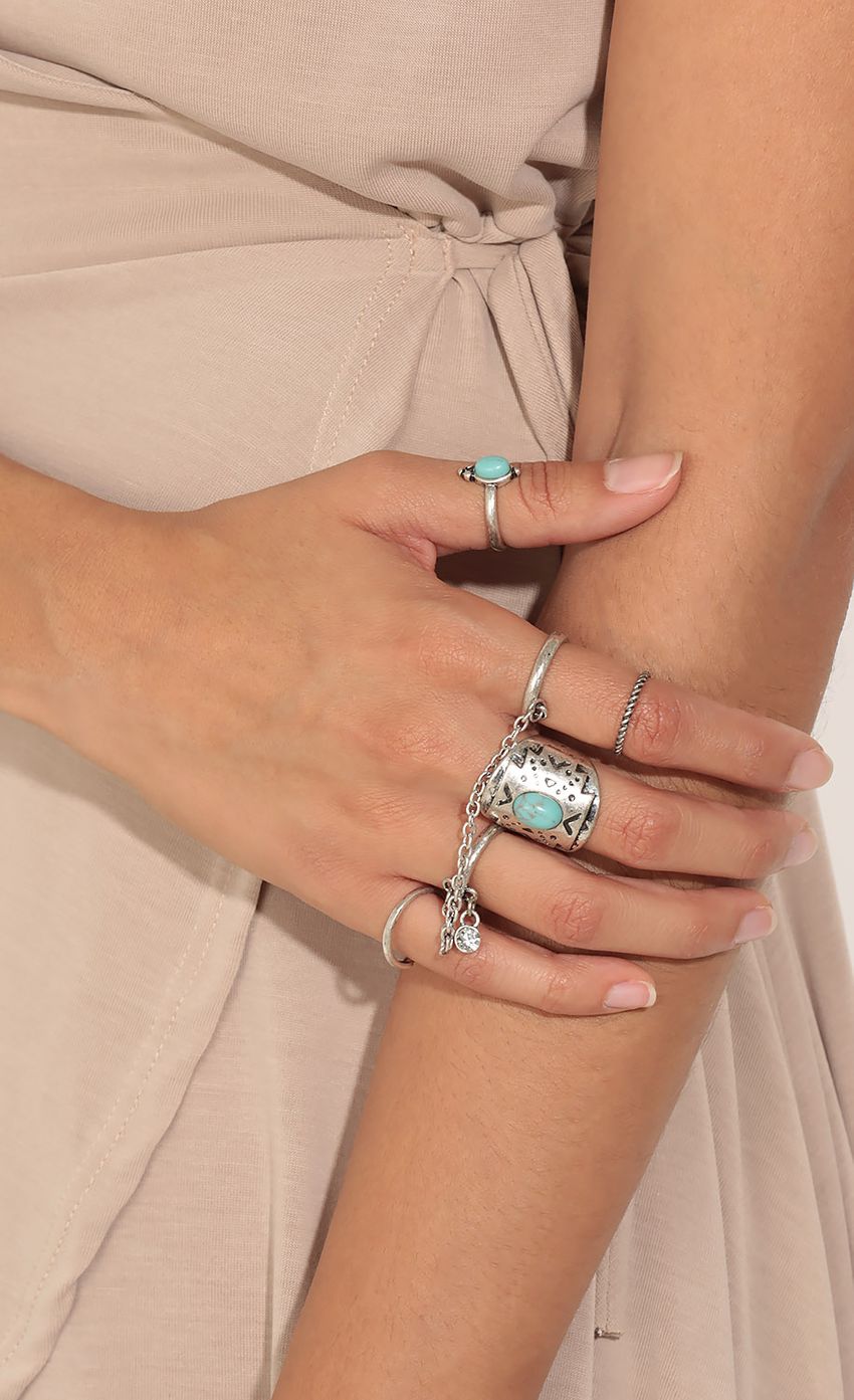 Picture Multi-Finger Ring Set In Silver And Turquoise. Source: https://media-img.lucyinthesky.com/data/Jun16_2/850xAUTO/0Y5A1759.JPG