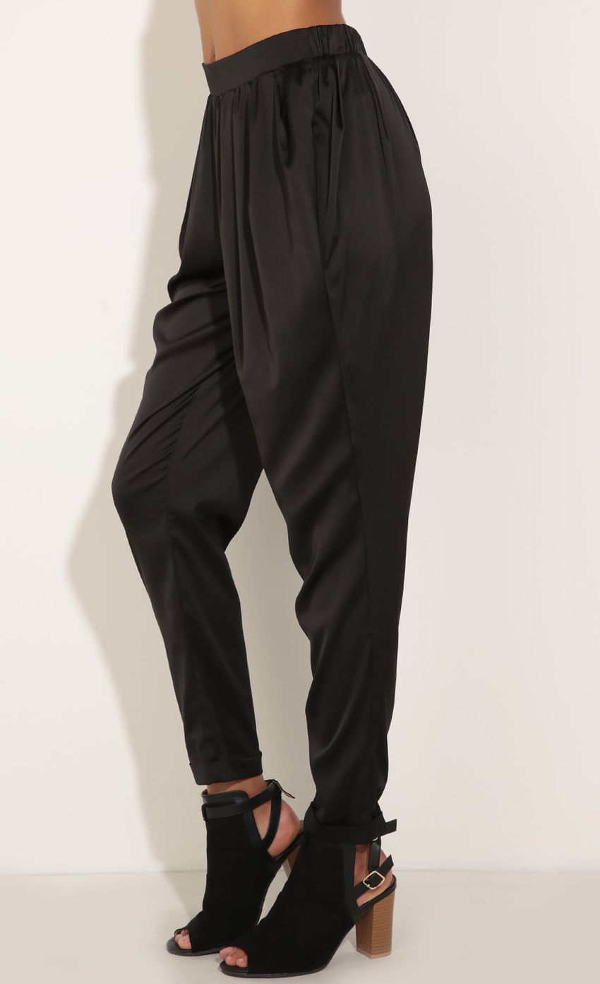 Picture Satin Pants In Black. Source: https://media-img.lucyinthesky.com/data/Jun16_2/850xAUTO/0Y5A2768.JPG