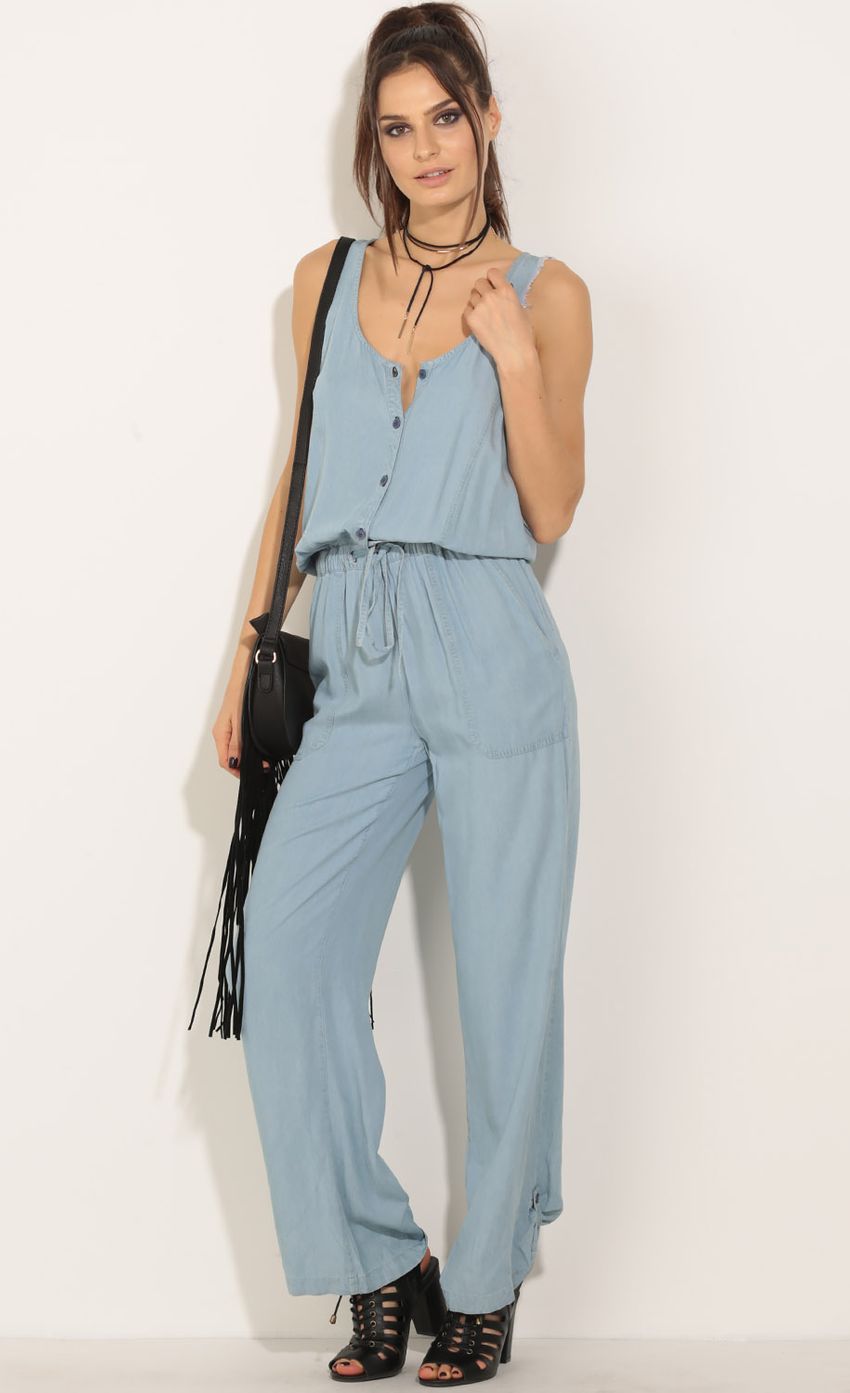 Picture Frayed Denim Jumpsuit In Light Blue. Source: https://media-img.lucyinthesky.com/data/Jun16_2/850xAUTO/0Y5A4445.JPG