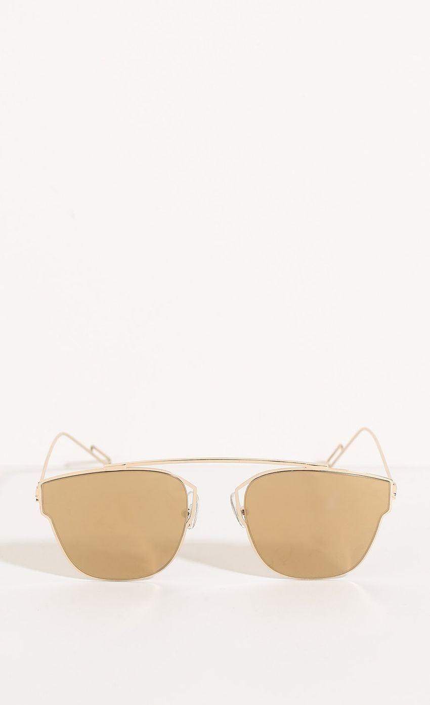 Picture Wayfarer Sunglasses In Gold. Source: https://media-img.lucyinthesky.com/data/Jun16_2/850xAUTO/0Y5A5290.JPG