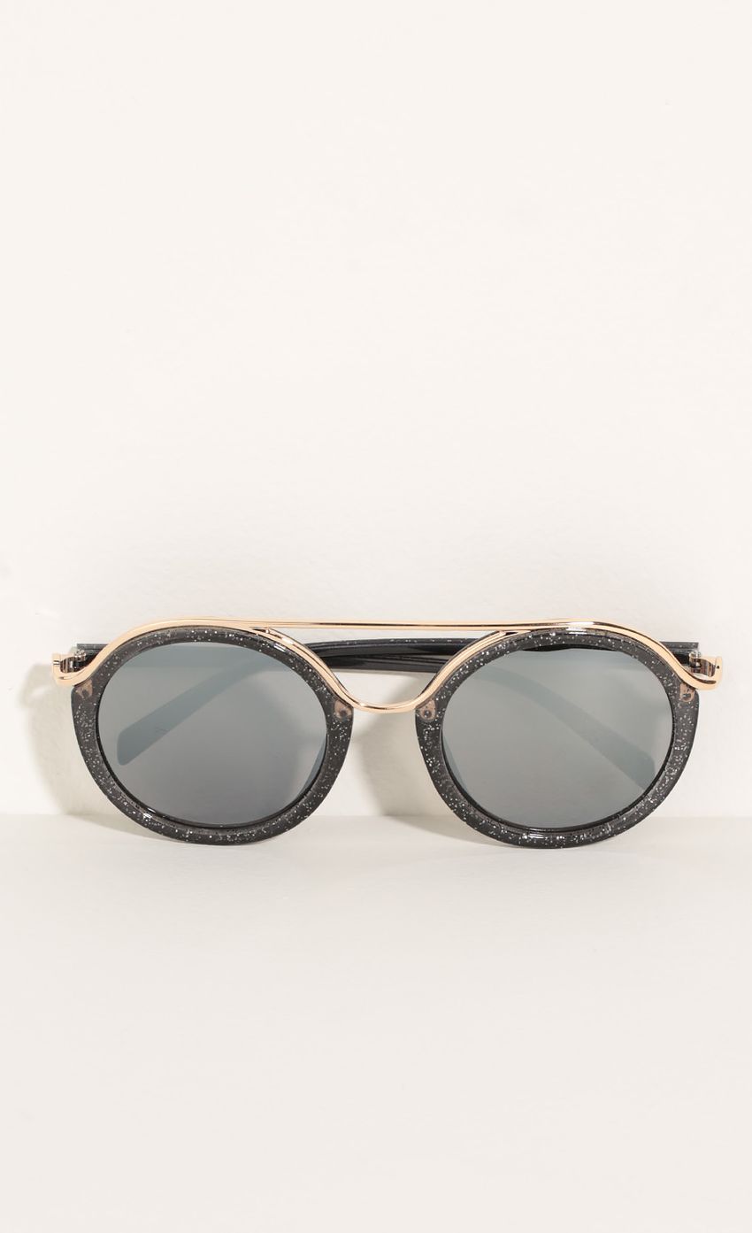 Picture Round Sunglasses In Black Glitter. Source: https://media-img.lucyinthesky.com/data/Jun16_2/850xAUTO/0Y5A6359.JPG